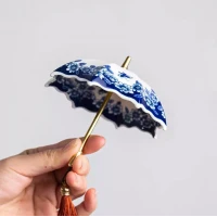Creative Spinning Umbrella Tea Strainer | Handcrafted Blue and White Porcelain Tea Infuser